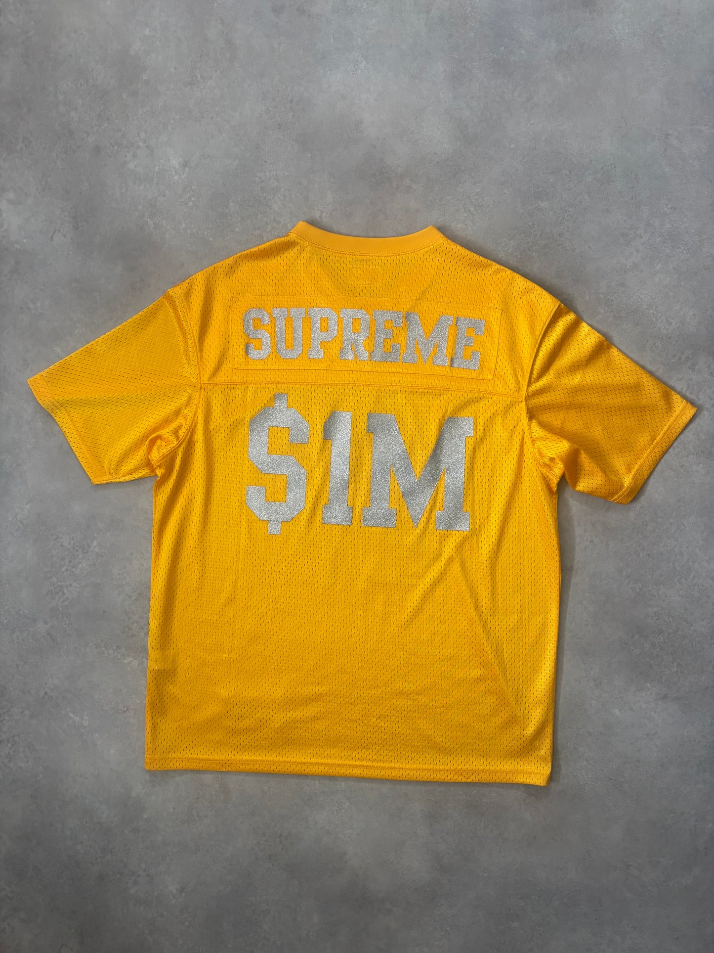Supreme $1M Glitter Football Top (Str. M)