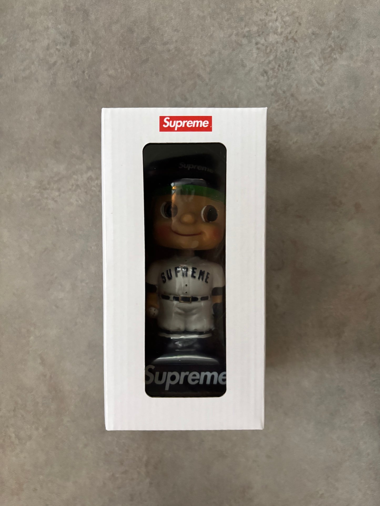 Supreme Bobblehead
