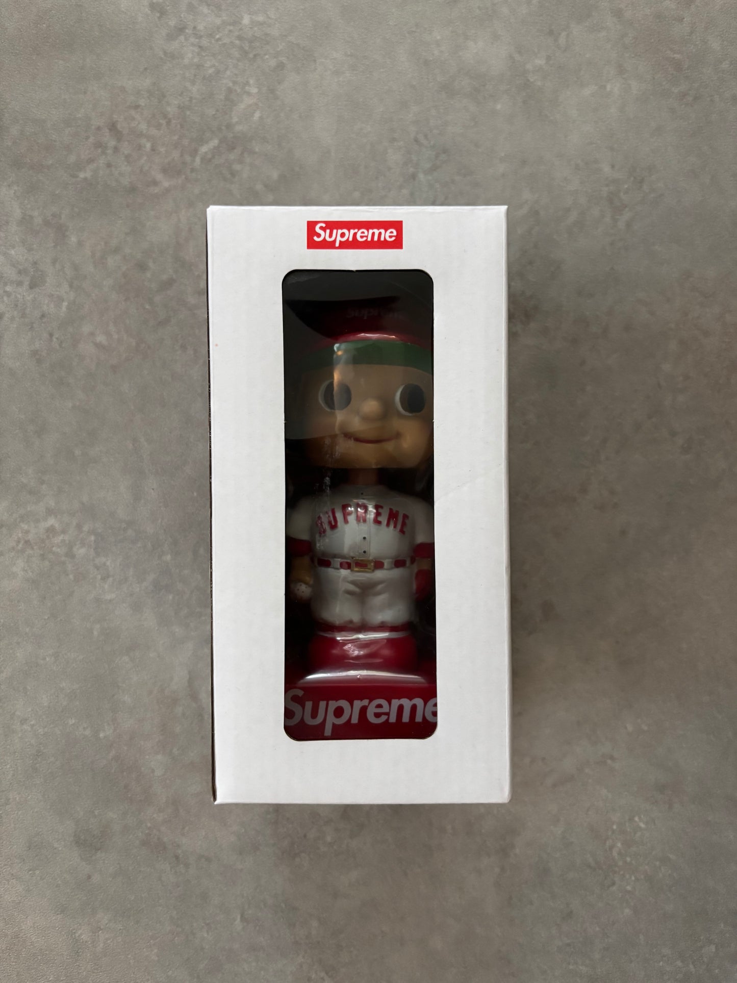 Supreme Bobblehead
