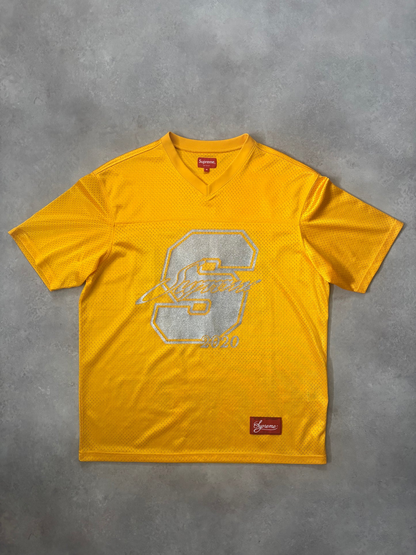 Supreme $1M Glitter Football Top (Str. M)