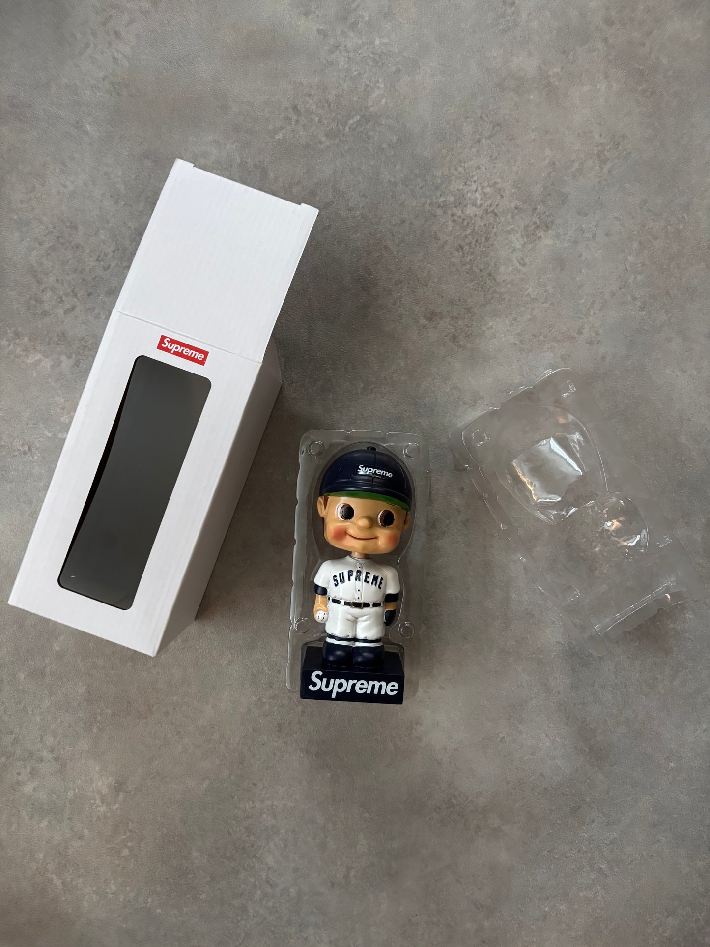 Supreme Bobblehead