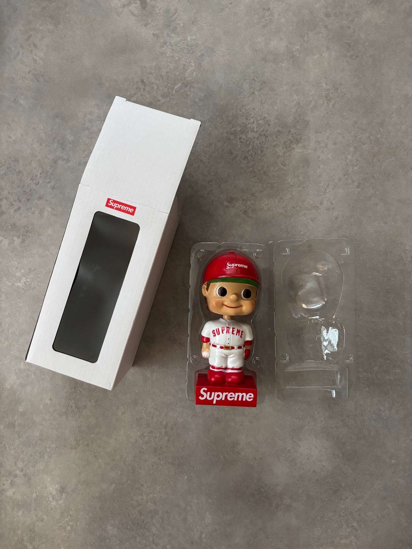 Supreme Bobblehead