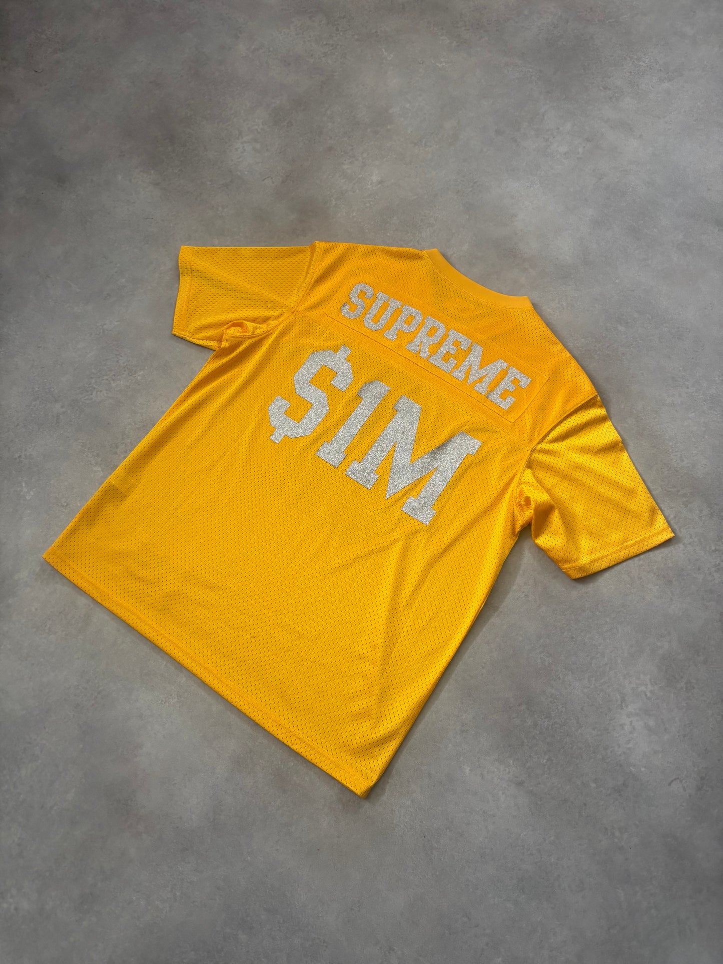 Supreme $1M Glitter Football Top (Str. M)