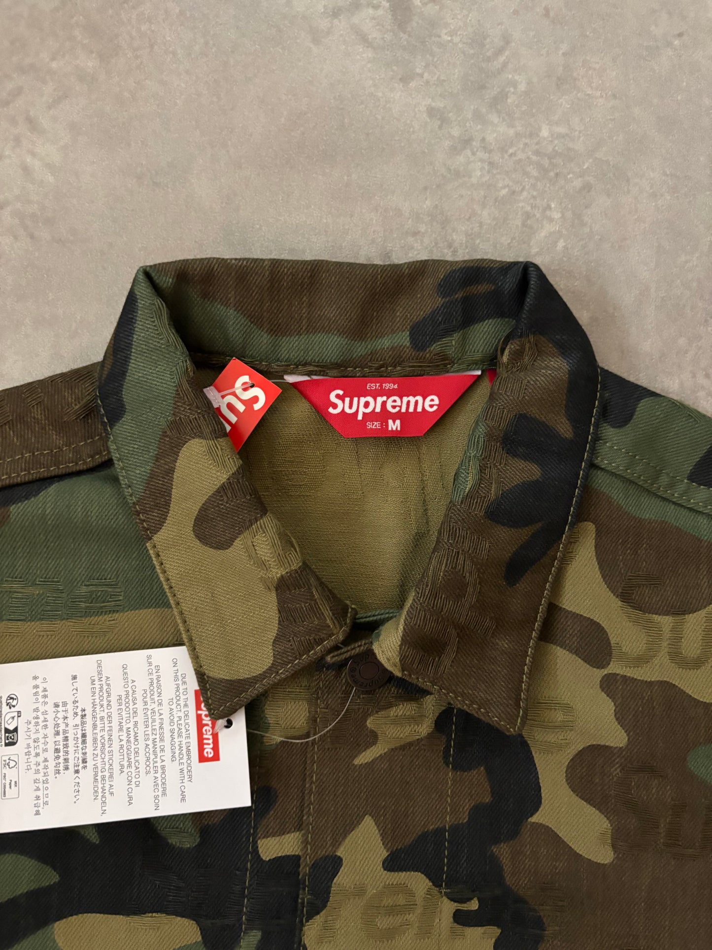 Supreme Jacquard Logos Denim Trucker Jacket