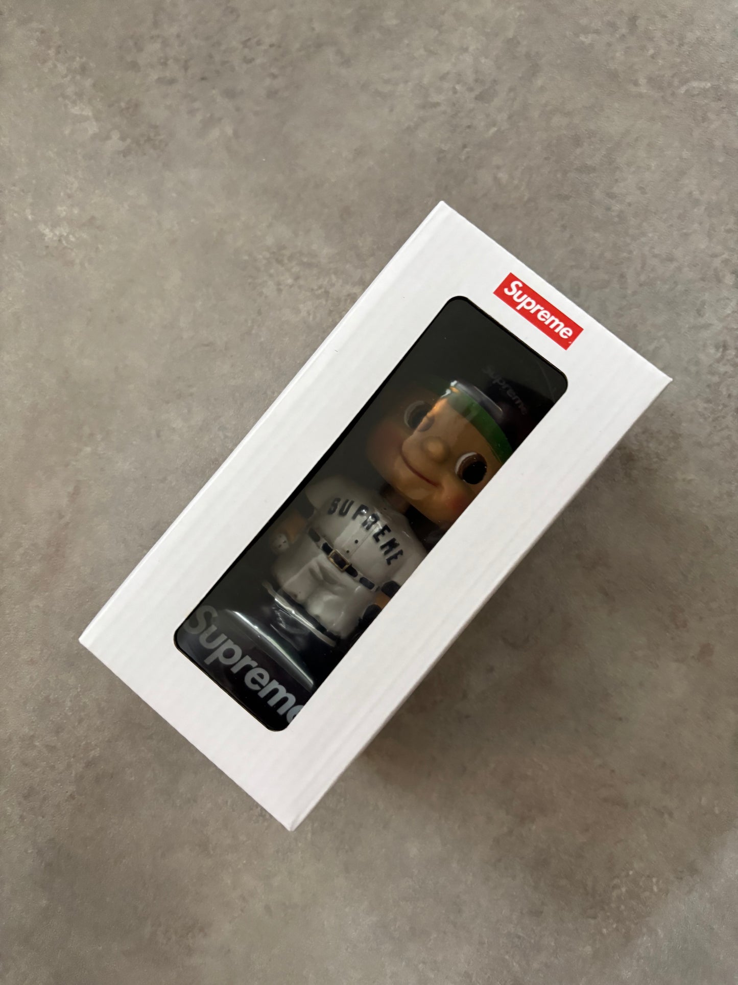 Supreme Bobblehead